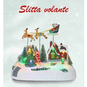 Irge Natale Villaggio Slitta Volante Con Luci Led, Carillon Con Movimento Circolare (cm22)  Art. Ina69