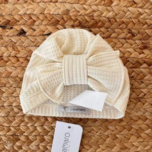 TURBANTE NEONATA PANNA IN COTONE NIDO D’APE CON FIOCCO